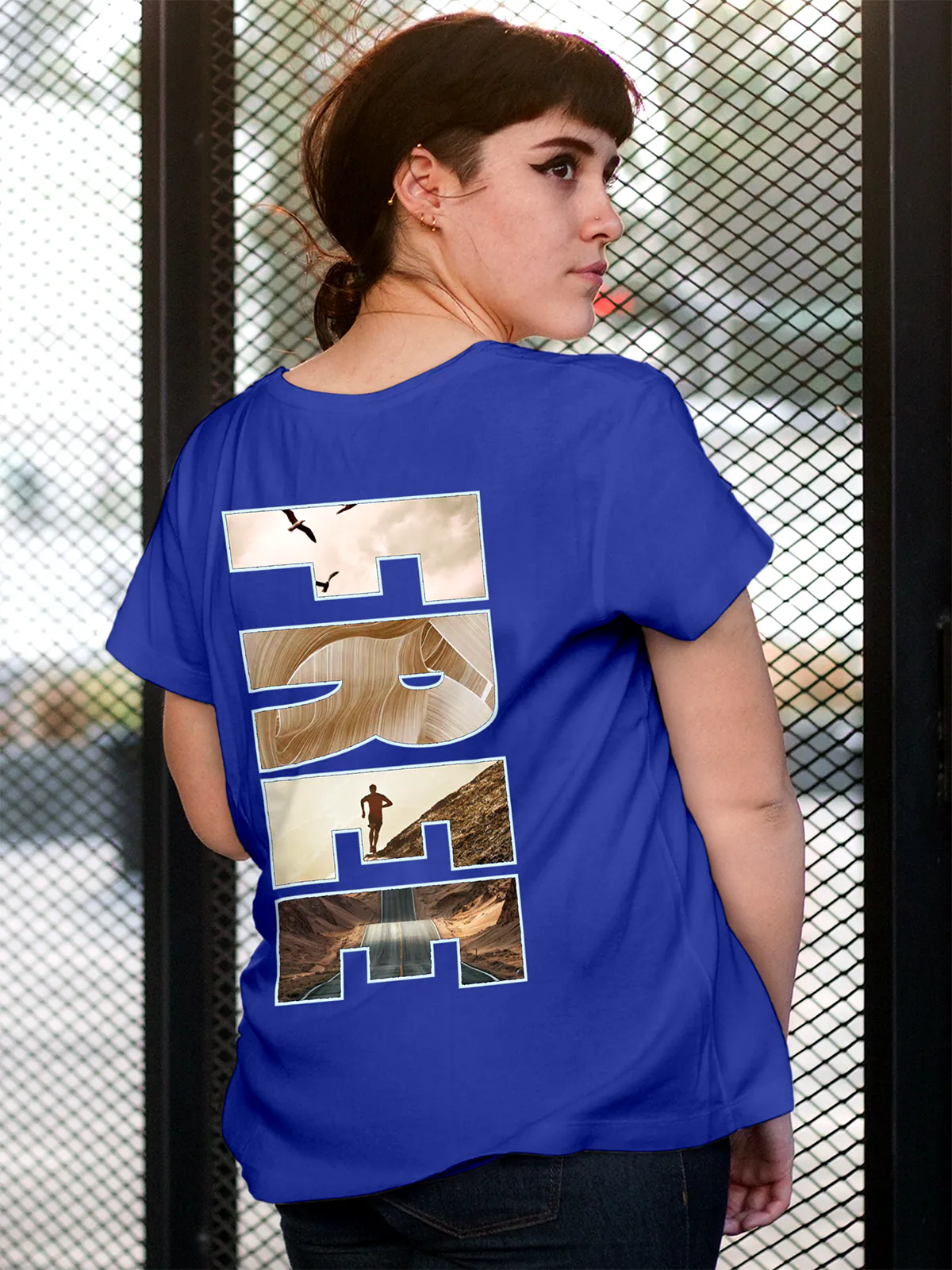Fighterhero T-shirts: Model wearing Women's Blue Round Neck T-shirt with 'Free & Boundless' design