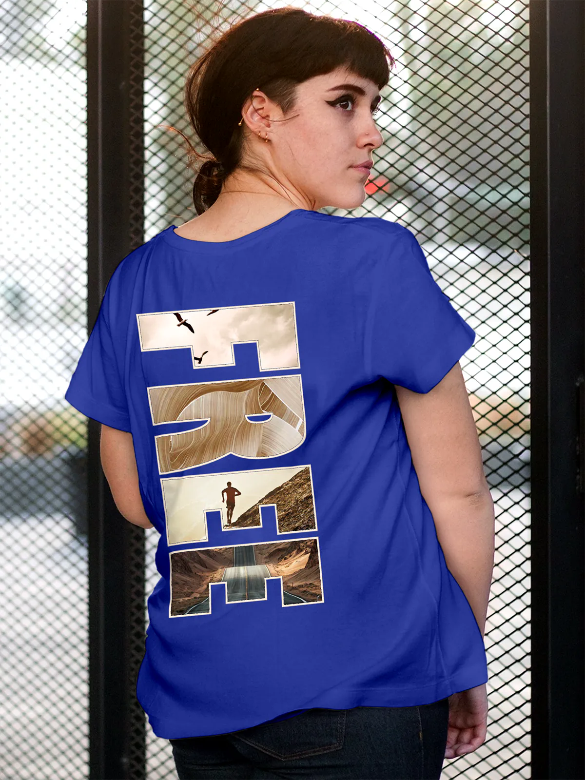 Model wearing Women's Blue Round Neck T-shirt with 'Free & Boundless' design, offering effortless style and premium comfort