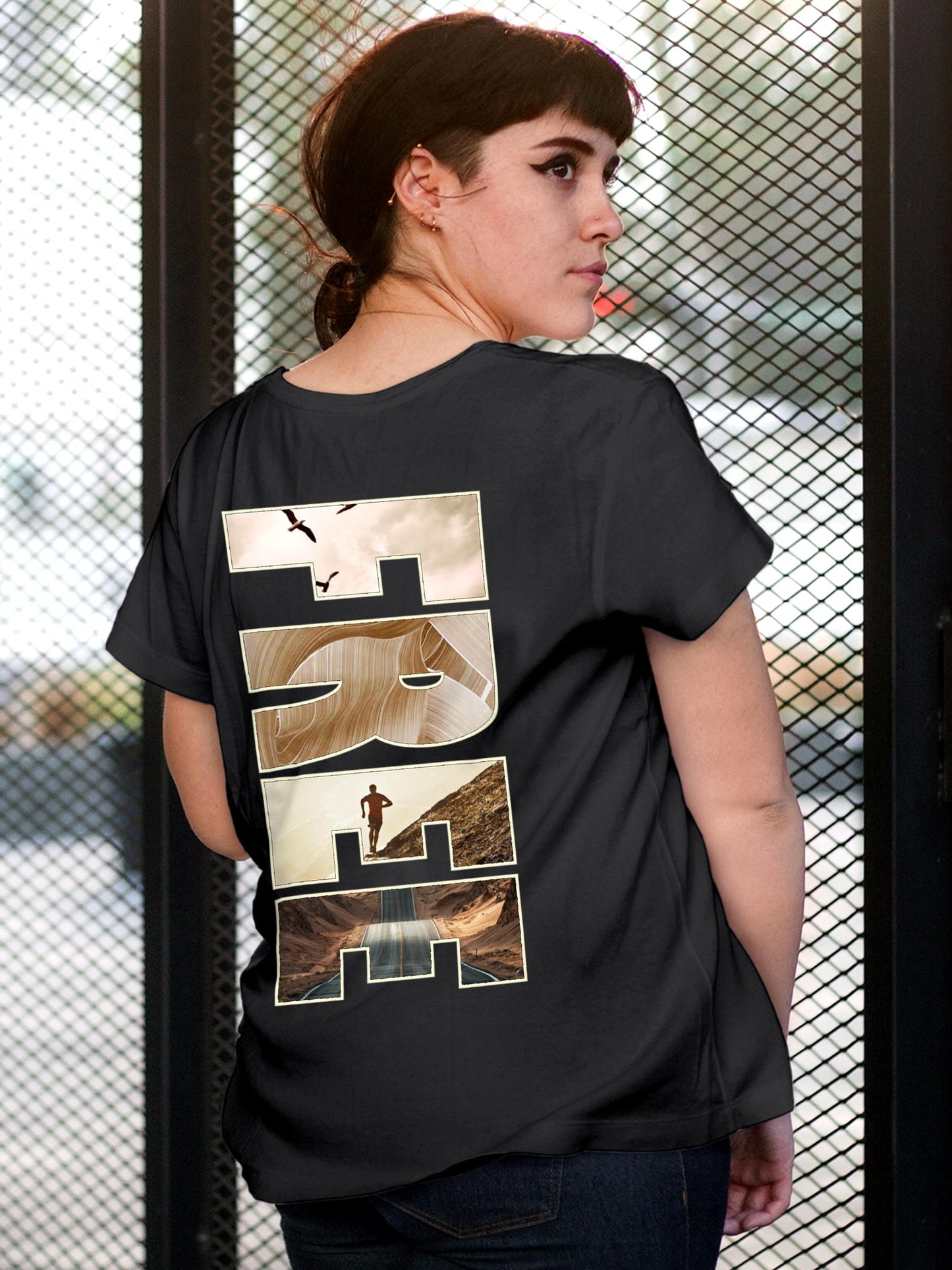 Model wearing Women's Dark Grey Round Neck T-shirt with 'Free & Boundless' design, offering effortless style and premium comfort