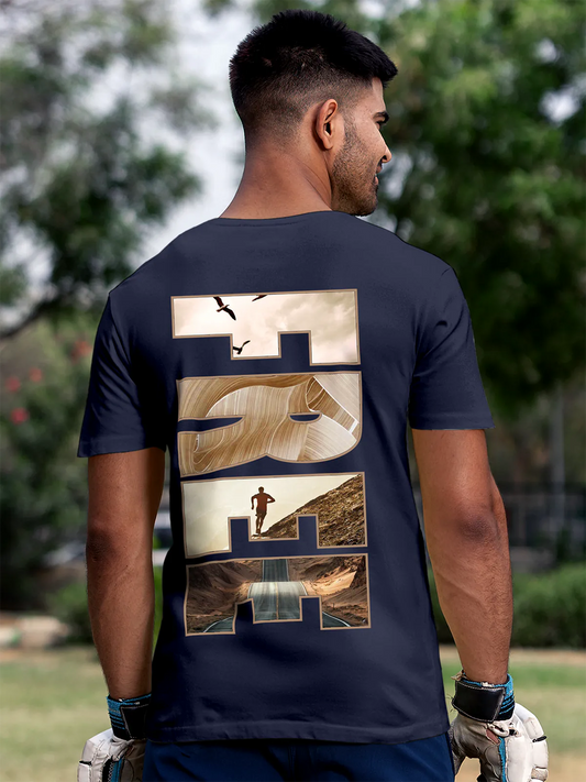Fighterhero T-shirts: Model wearing Men's Navy Blue Round Neck T-shirt with 'Free & Boundless' design