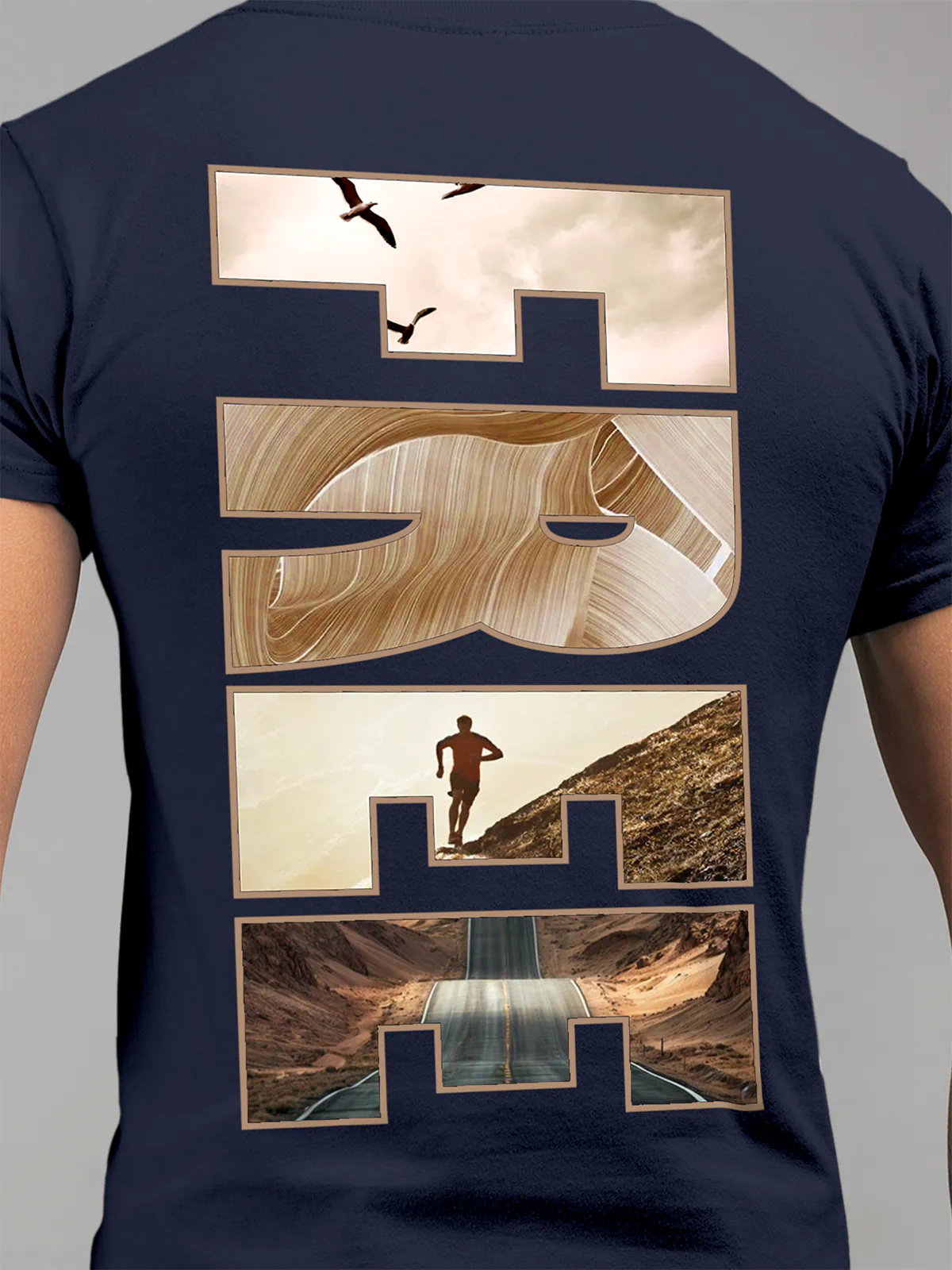 Close up of 'Free & Boundless' design on Men's Navy Blue Round Neck T-shirt, highlighting intricate details and vibrant print.