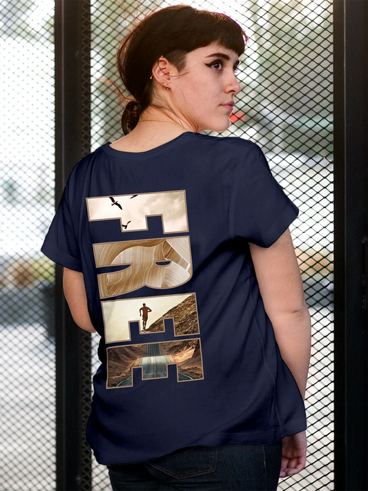Fighterhero T-shirts: Model wearing Women's Navy Blue Round Neck T-shirt with 'Free & Boundless' design