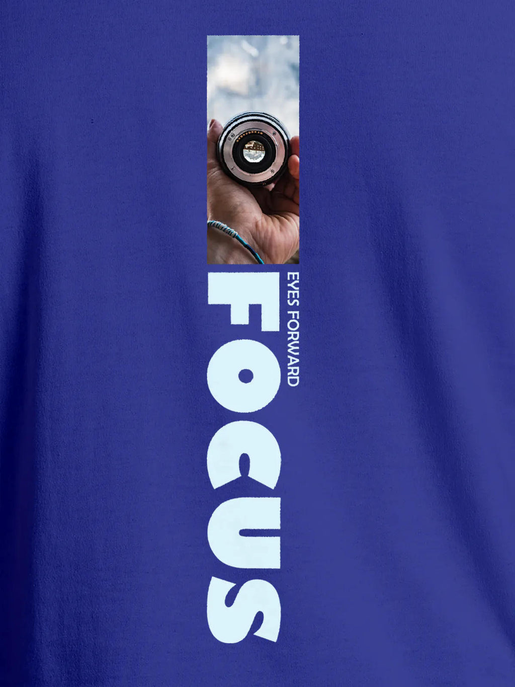 Close up of 'Focus' design on Women's Blue Round Neck T-shirt, highlighting intricate details and vibrant print.