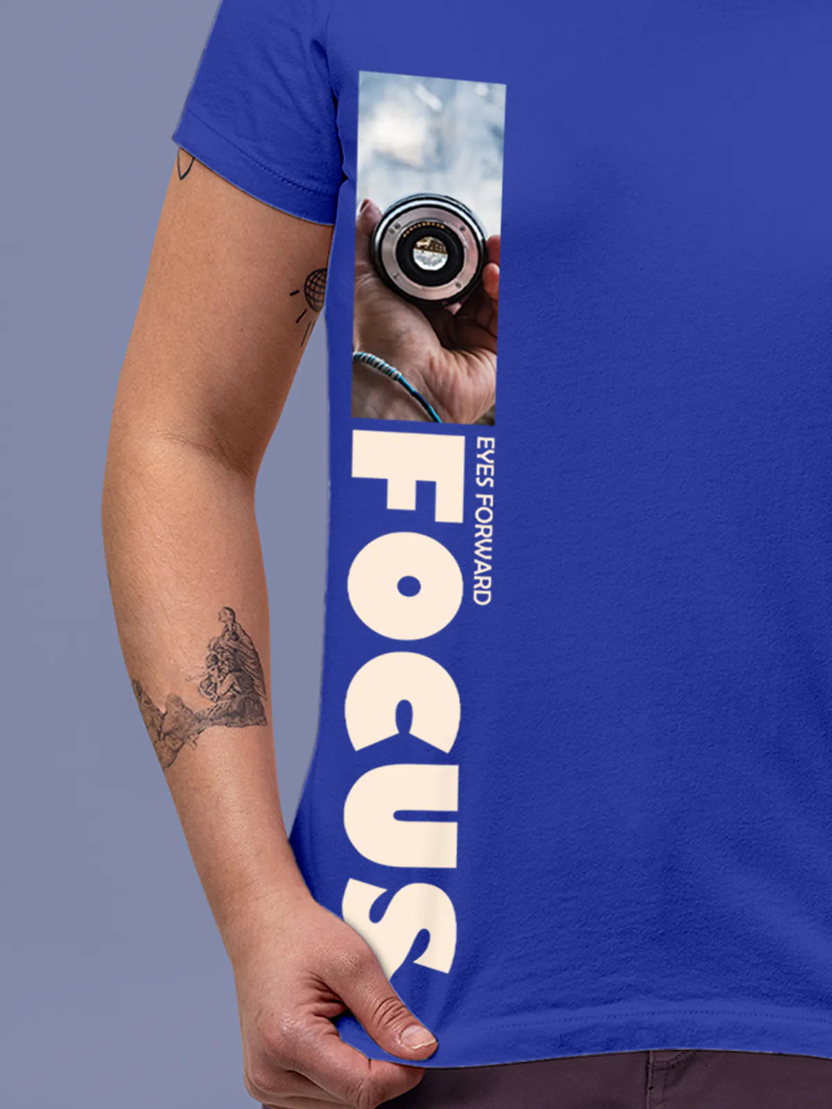 Close up of 'Focus' design on Women's Blue Round Neck T-shirt, highlighting intricate details and vibrant print.