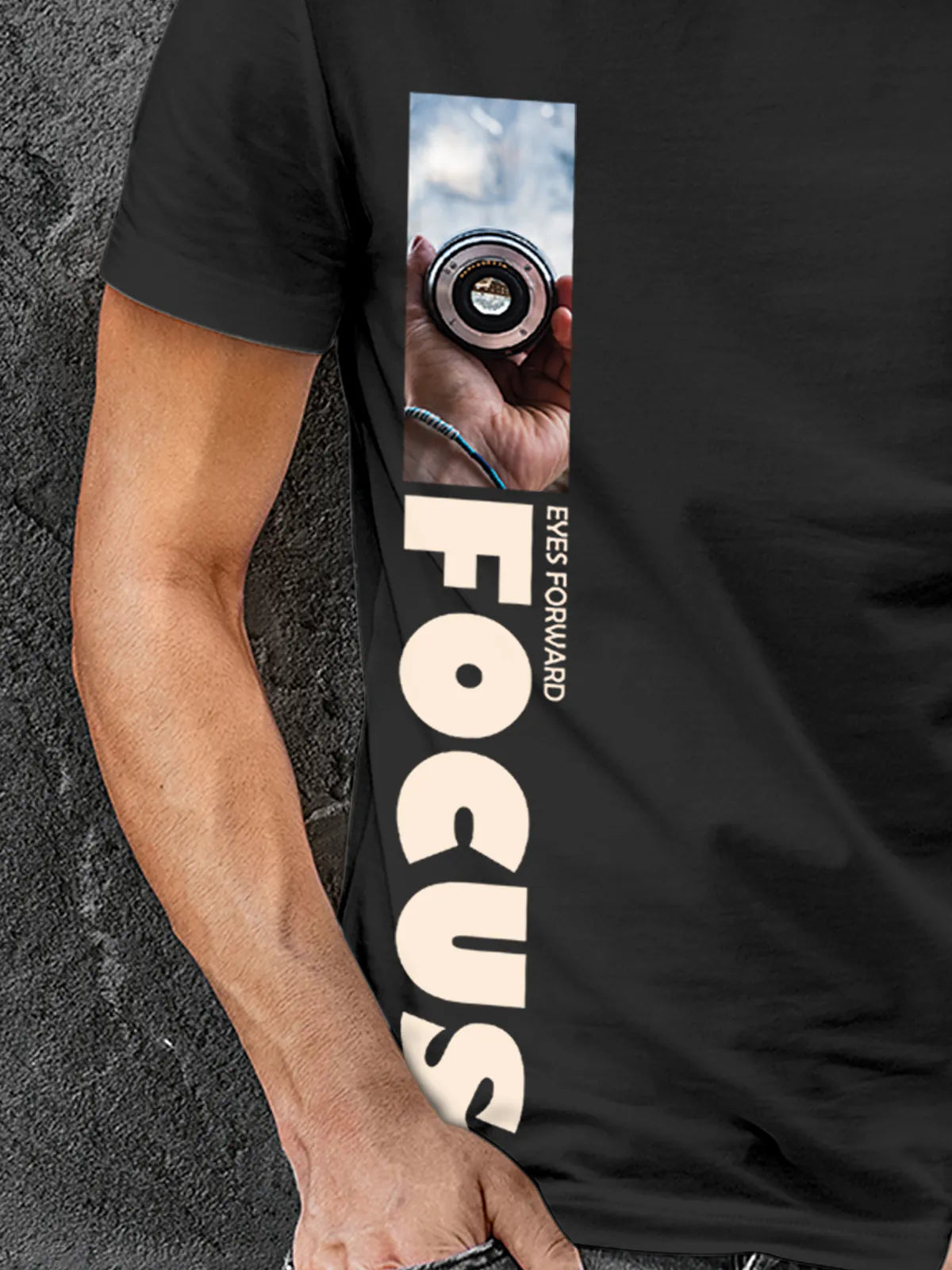 Close up of 'Focus' design on Men's Dark Grey Round Neck T-shirt, highlighting intricate details and vibrant print.