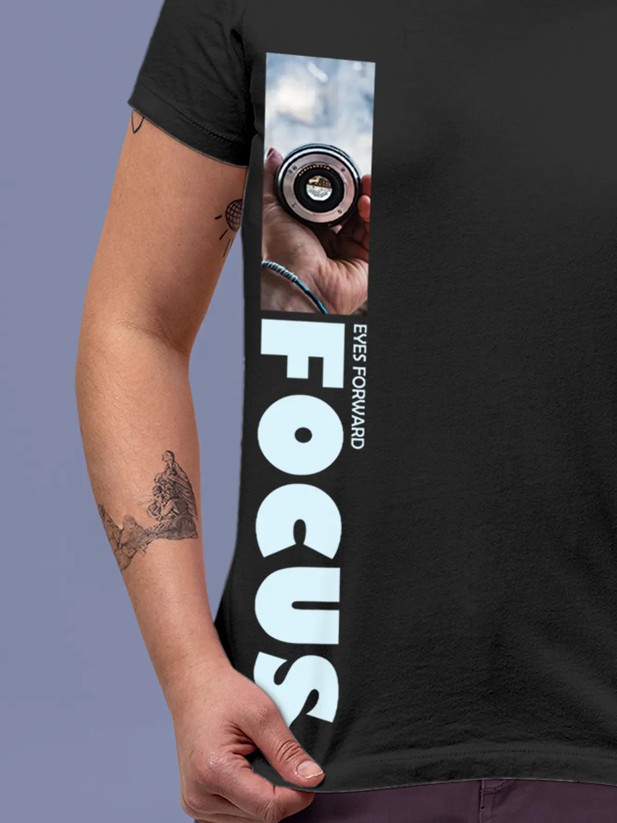 Close up of 'Focus' design on Women's Dark Grey Round Neck T-shirt, highlighting intricate details and vibrant print.