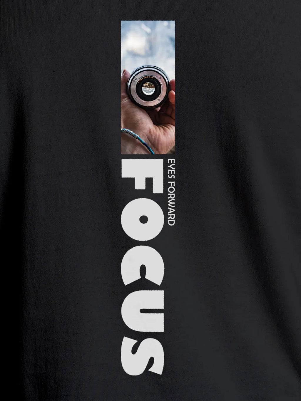 Close up of 'Focus' design on Women's Dark Grey Round Neck T-shirt, highlighting intricate details and vibrant print.
