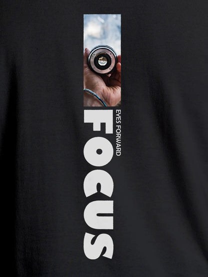 Close up of 'Focus' design on Women's Dark Grey Round Neck T-shirt, highlighting intricate details and vibrant print.