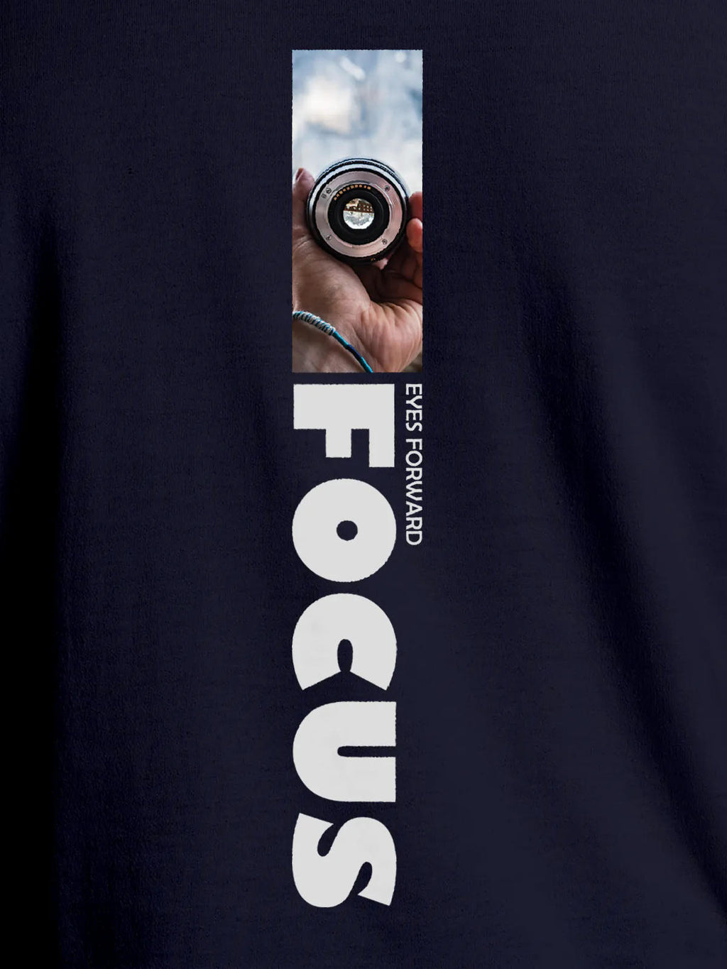 Close up of 'Focus' design on Women's Navy Blue Round Neck T-shirt, highlighting intricate details and vibrant print.
