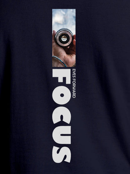 Close up of 'Focus' design on Women's Navy Blue Round Neck T-shirt, highlighting intricate details and vibrant print.