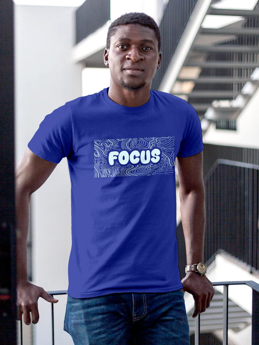 Fighterhero T-shirts: Model wearing Men's Blue Round Neck T-shirt with 'Focus In Chaos' design