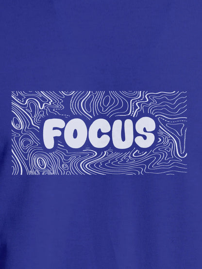 Close up of 'Focus In Chaos' design on Women's Blue Round Neck T-shirt, highlighting intricate details and vibrant print.
