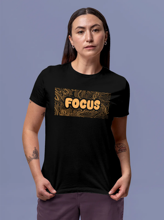 Fighterhero T-shirts: Model wearing Women's Black Round Neck T-shirt with 'Focus In Chaos' design