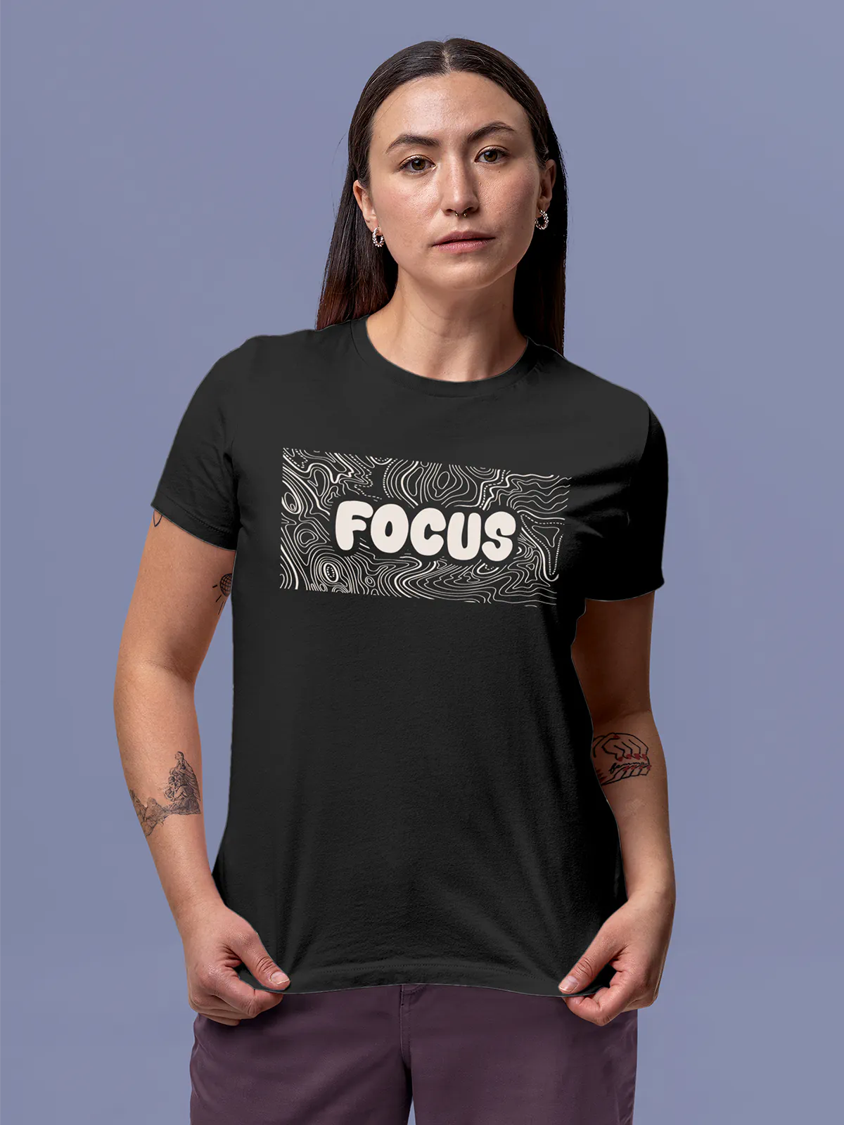 Model wearing Women's Dark Grey Round Neck T-shirt with 'Focus In Chaos' design, offering effortless style and premium comfort