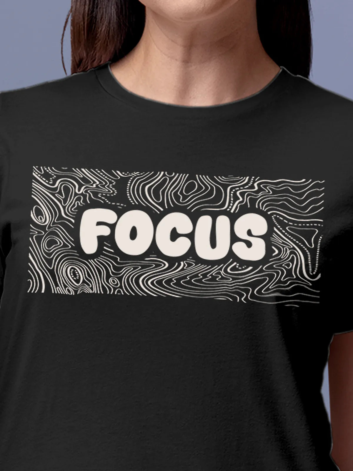 Close up of 'Focus In Chaos' design on Women's Dark Grey Round Neck T-shirt, highlighting intricate details and vibrant print.