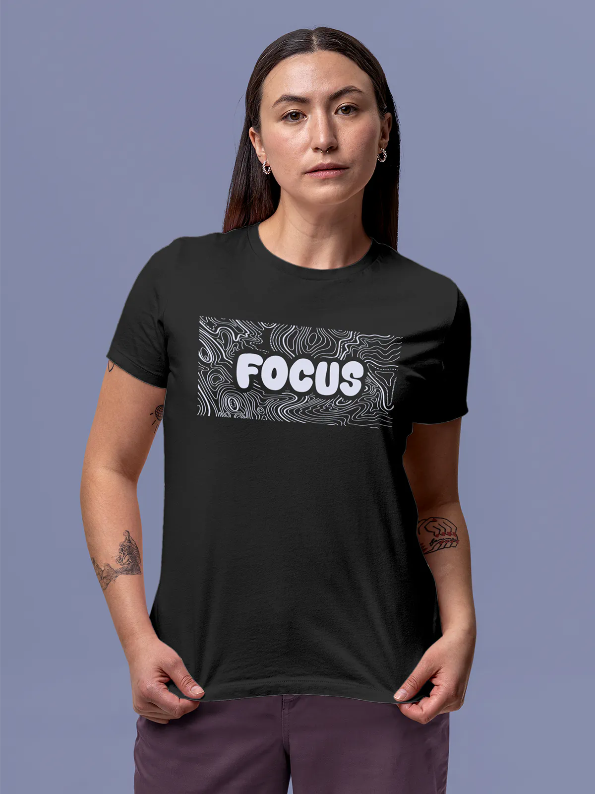 Model wearing Women's Dark Grey Round Neck T-shirt with 'Focus In Chaos' design, offering effortless style and premium comfort