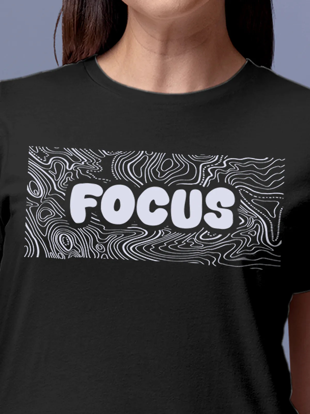 Close up of 'Focus In Chaos' design on Women's Dark Grey Round Neck T-shirt, highlighting intricate details and vibrant print.