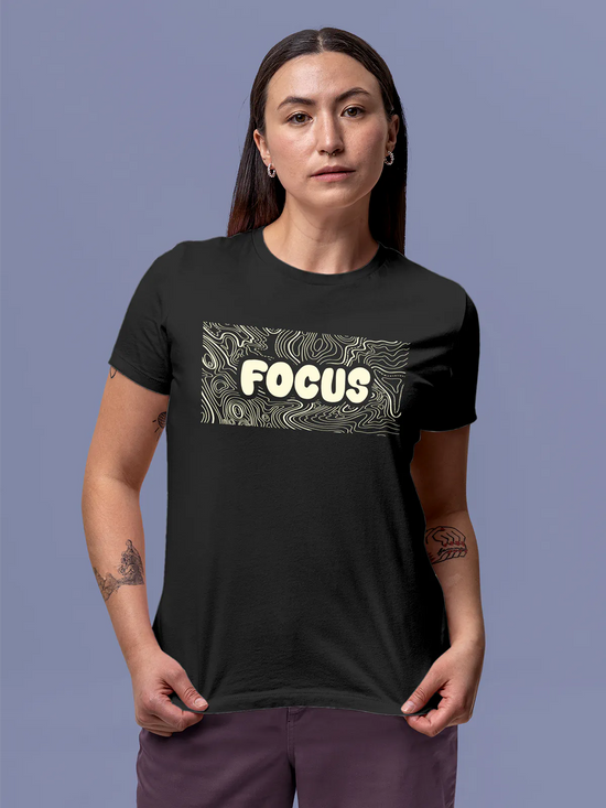 Fighterhero T-shirts: Model wearing Women's Dark Grey Round Neck T-shirt with 'Focus In Chaos' design