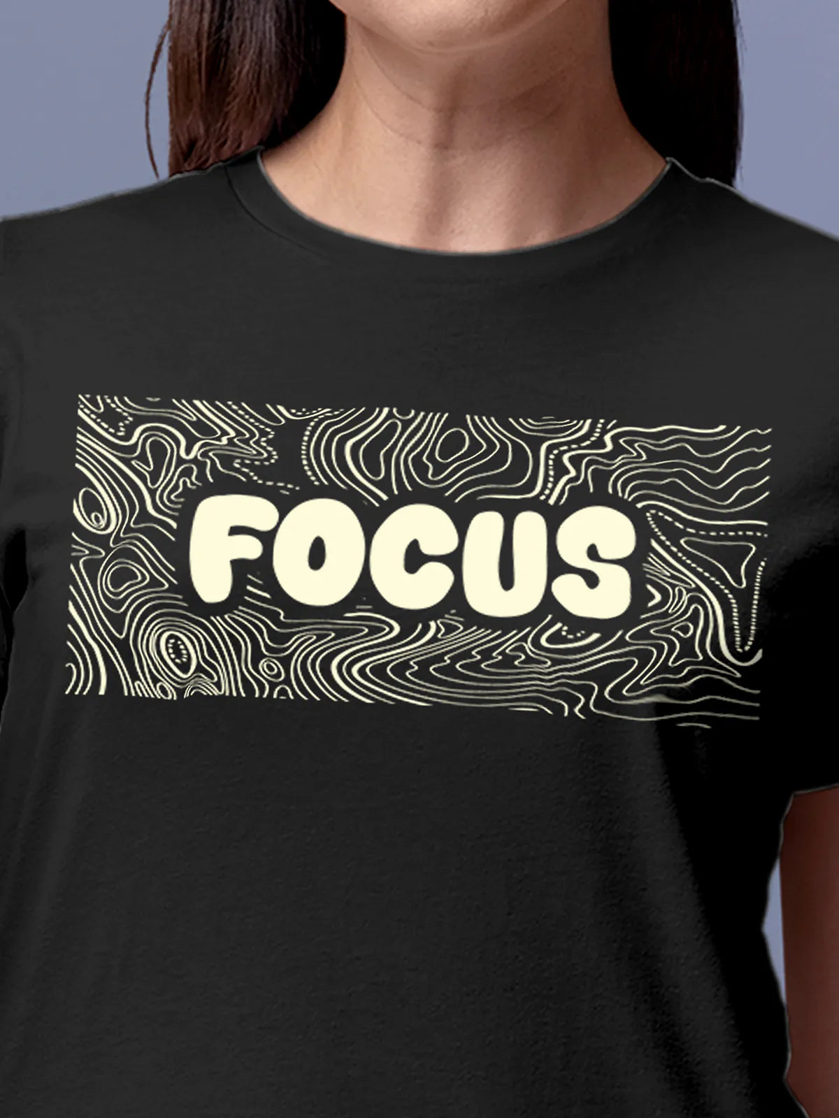 Close up of 'Focus In Chaos' design on Women's Dark Grey Round Neck T-shirt, highlighting intricate details and vibrant print.