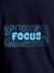 Close up of 'Focus In Chaos' design on Men's Navy Blue Round Neck T-shirt, highlighting intricate details and vibrant print.