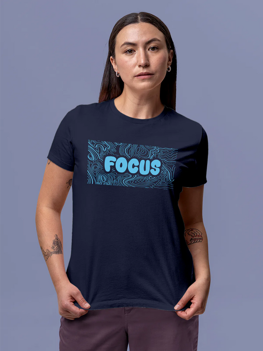Fighterhero T-shirts: Model wearing Women's Navy Blue Round Neck T-shirt with 'Focus In Chaos' design