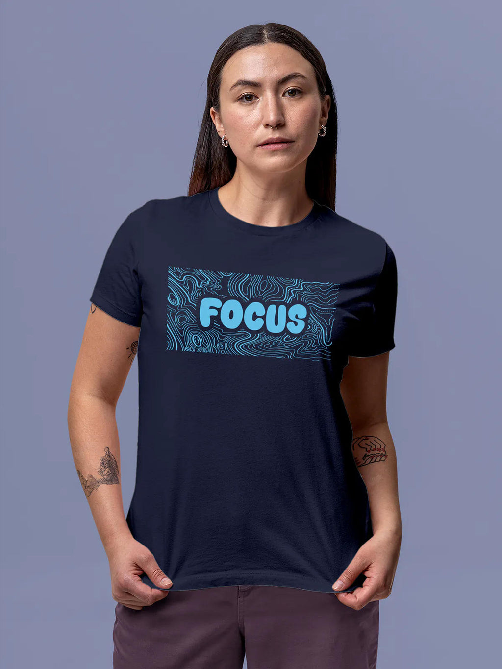 Model wearing Women's Navy Blue Round Neck T-shirt with 'Focus In Chaos' design, offering effortless style and premium comfort