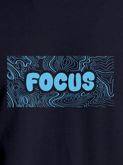 Close up of 'Focus In Chaos' design on Women's Navy Blue Round Neck T-shirt, highlighting intricate details and vibrant print.