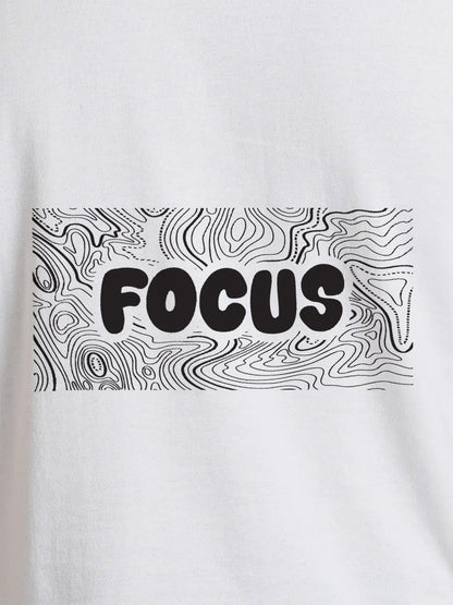 Close up of 'Focus In Chaos' design on Men's White Round Neck T-shirt, highlighting intricate details and vibrant print.