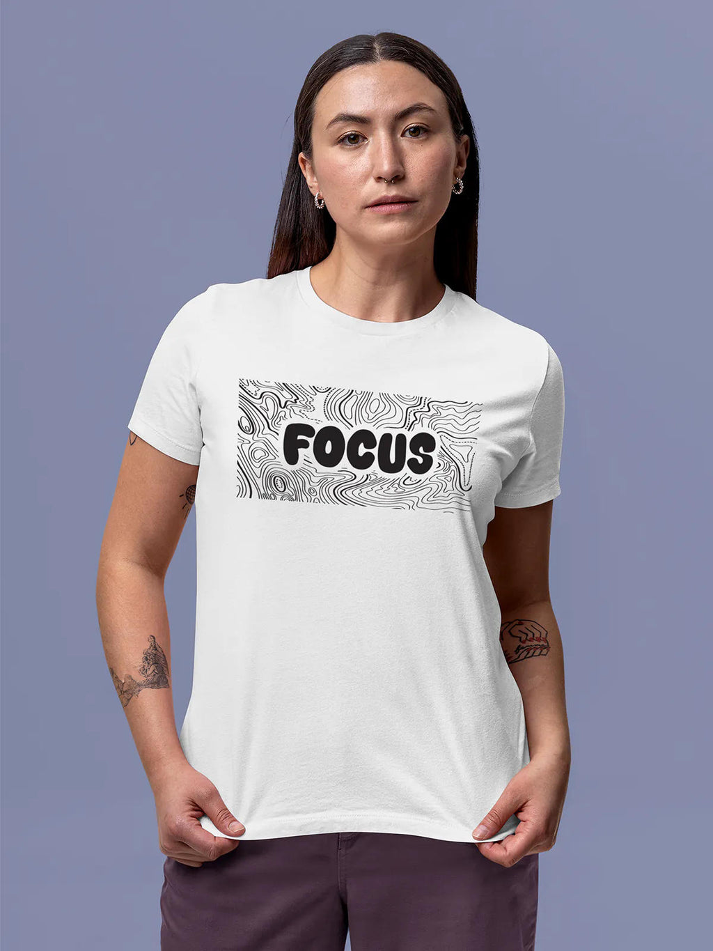 Model wearing Women's White Round Neck T-shirt with 'Focus In Chaos' design, offering effortless style and premium comfort