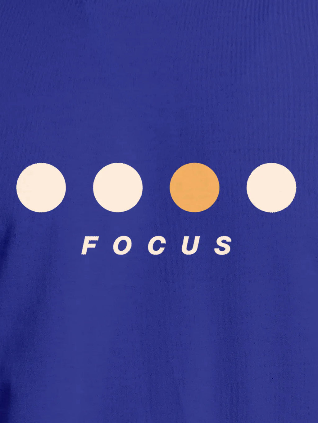 Close up of 'Focus On Goal' design on Men's Blue Round Neck T-shirt, highlighting intricate details and vibrant print.
