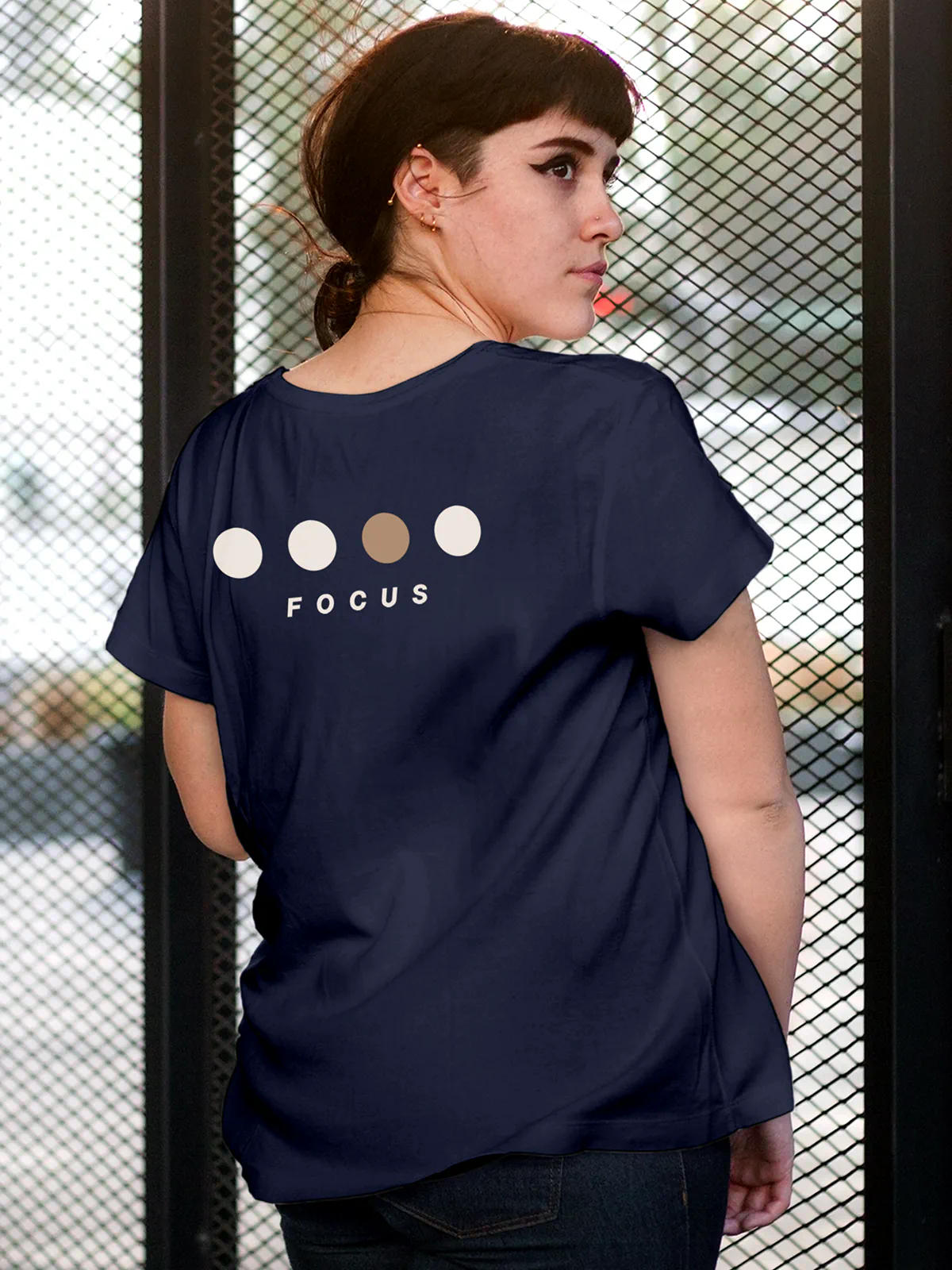 Model wearing Women's Navy Blue Round Neck T-shirt with 'Focus On Goal' design, offering effortless style and premium comfort