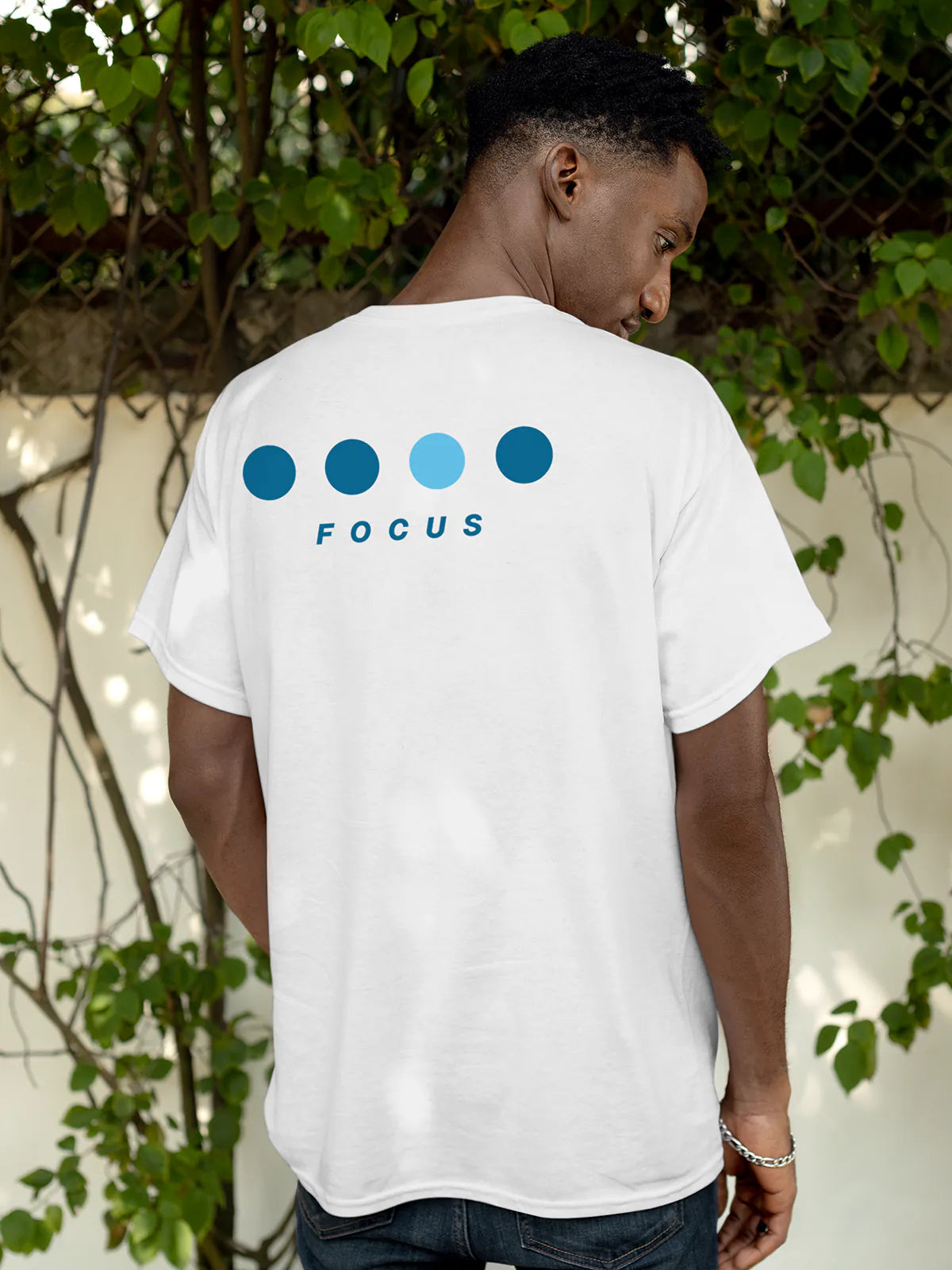 Fighterhero T-shirts: Model wearing Men's White Round Neck T-shirt with 'Focus On Goal' design