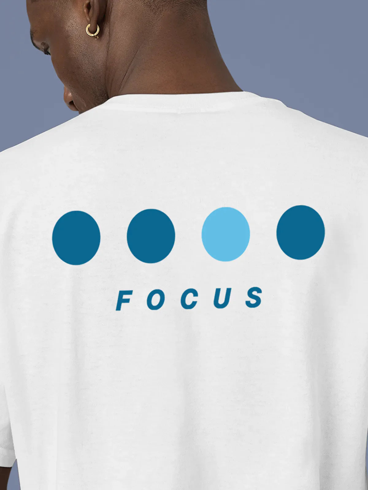 Close up of 'Focus On Goal' design on Men's White Round Neck T-shirt, highlighting intricate details and vibrant print.
