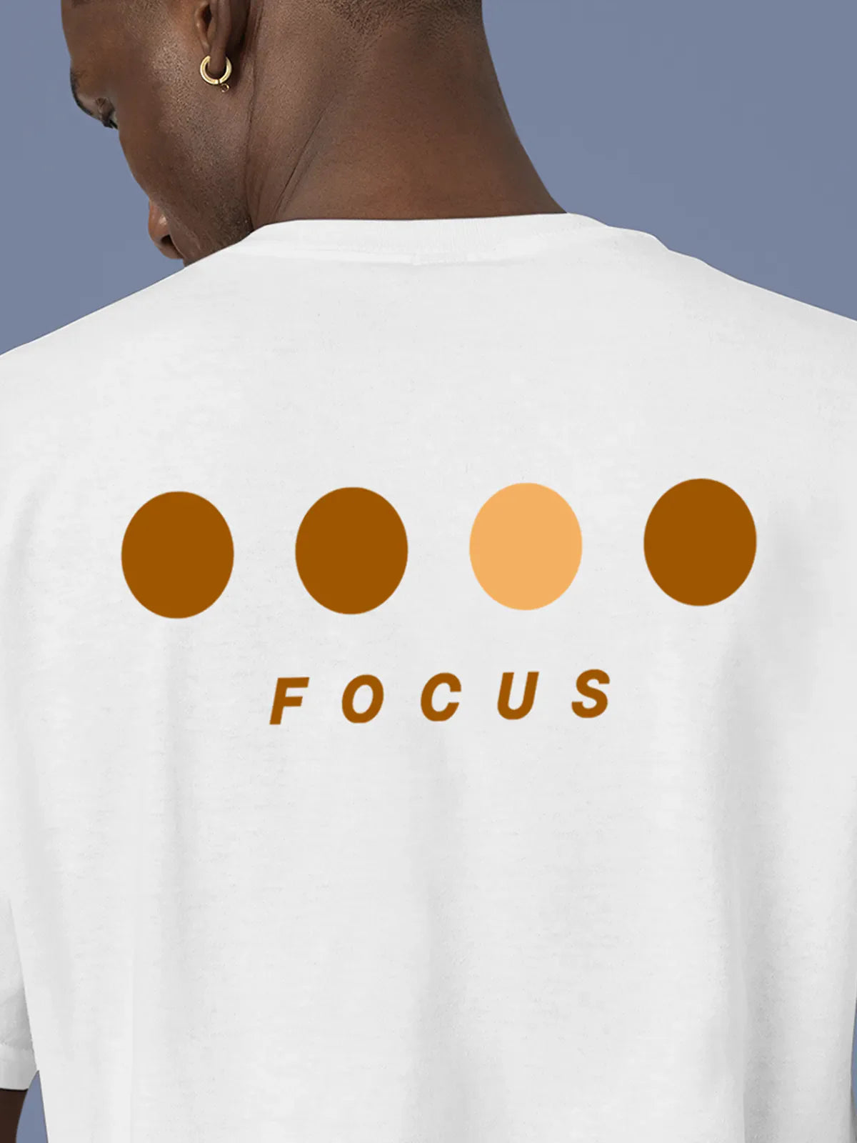 Close up of 'Focus On Goal' design on Men's White Round Neck T-shirt, highlighting intricate details and vibrant print.