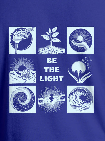 Close up of 'Be The Light' design on Men's Blue Round Neck T-shirt, highlighting intricate details and vibrant print.
