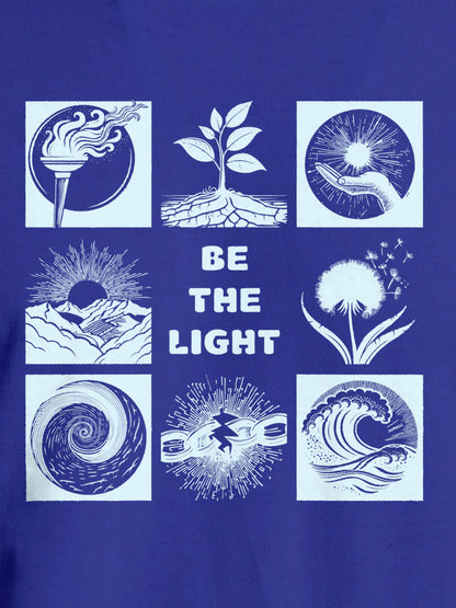 Close up of 'Be The Light' design on Women's Blue Round Neck T-shirt, highlighting intricate details and vibrant print.