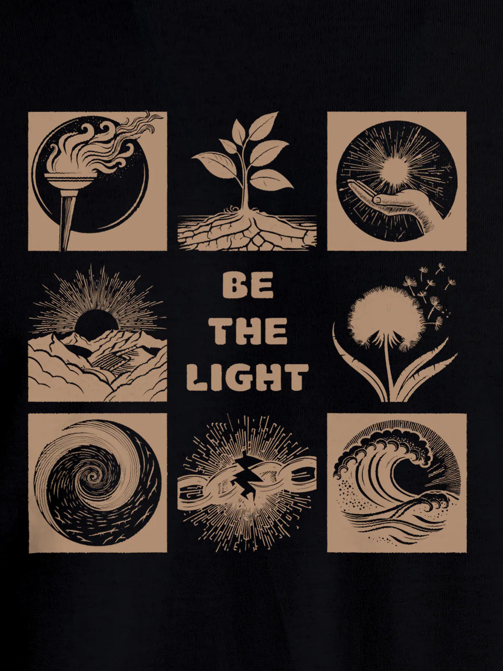 Close up of 'Be The Light' design on Women's Black Round Neck T-shirt, highlighting intricate details and vibrant print.