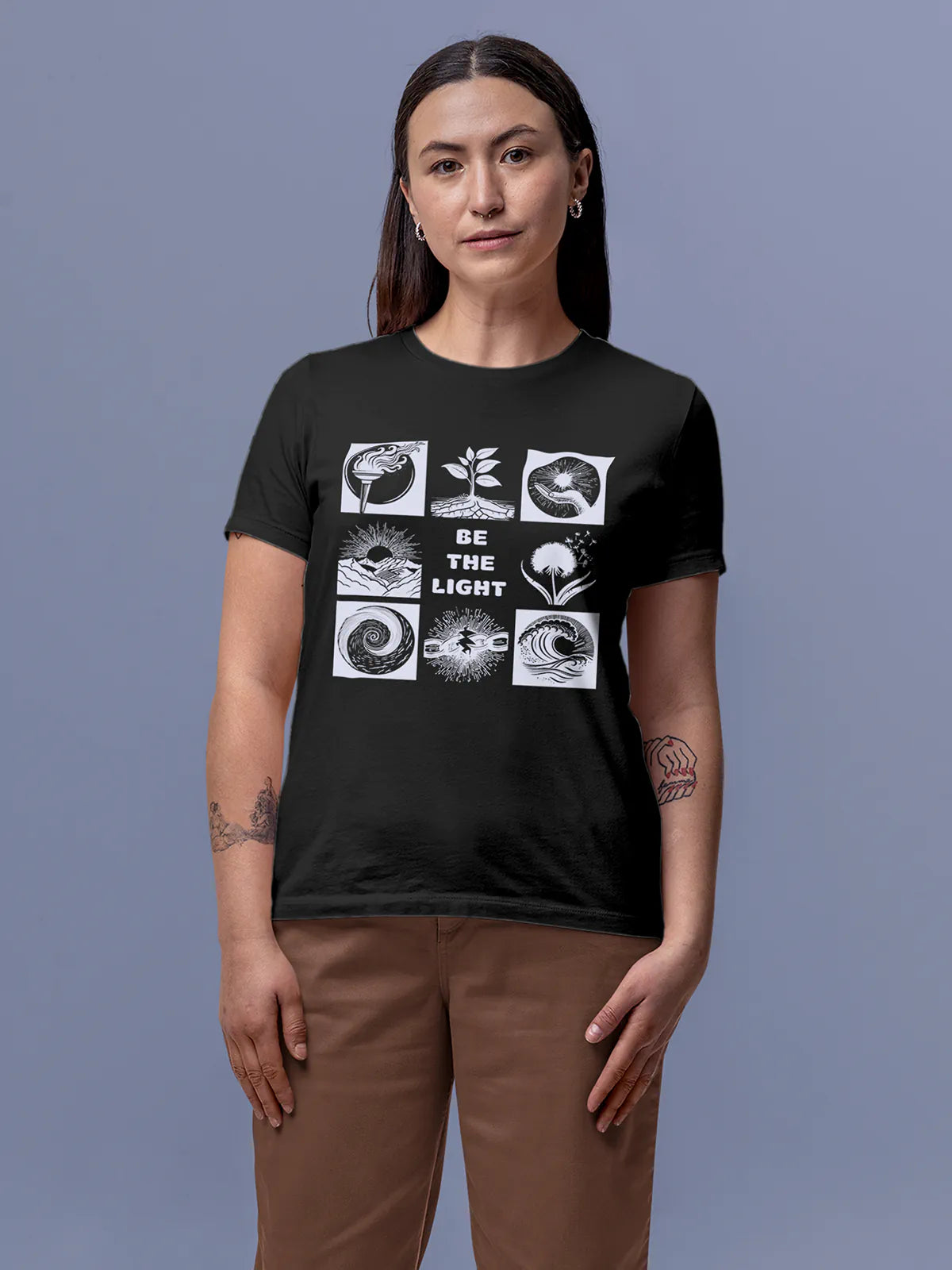 Model wearing Women's Dark Grey Round Neck T-shirt with 'Be The Light' design, offering effortless style and premium comfort