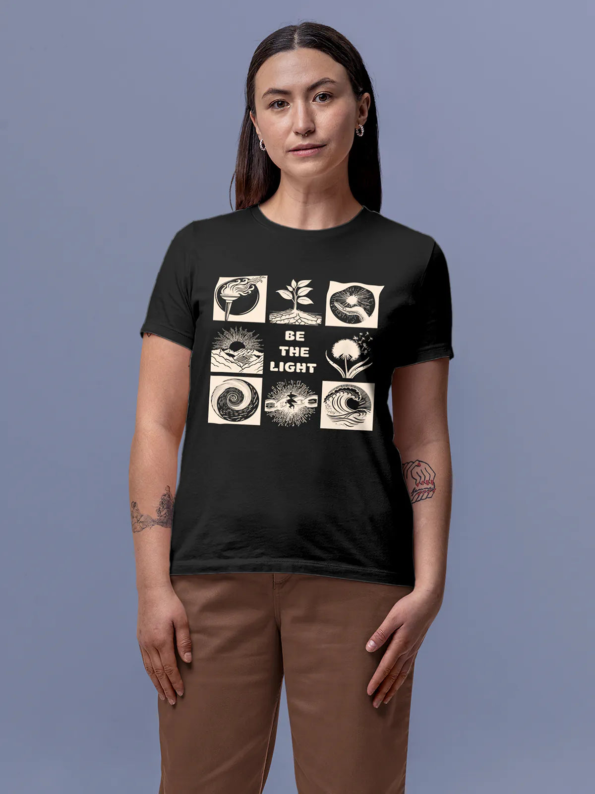 Model wearing Women's Dark Grey Round Neck T-shirt with 'Be The Light' design, offering effortless style and premium comfort