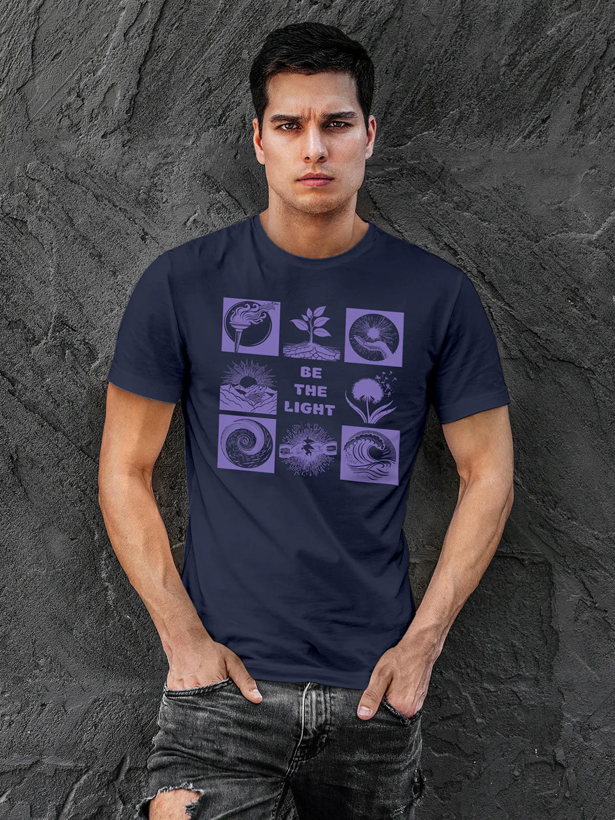 Model wearing Men's Navy Blue Round Neck T-shirt with 'Be The Light' design, offering effortless style and premium comfort