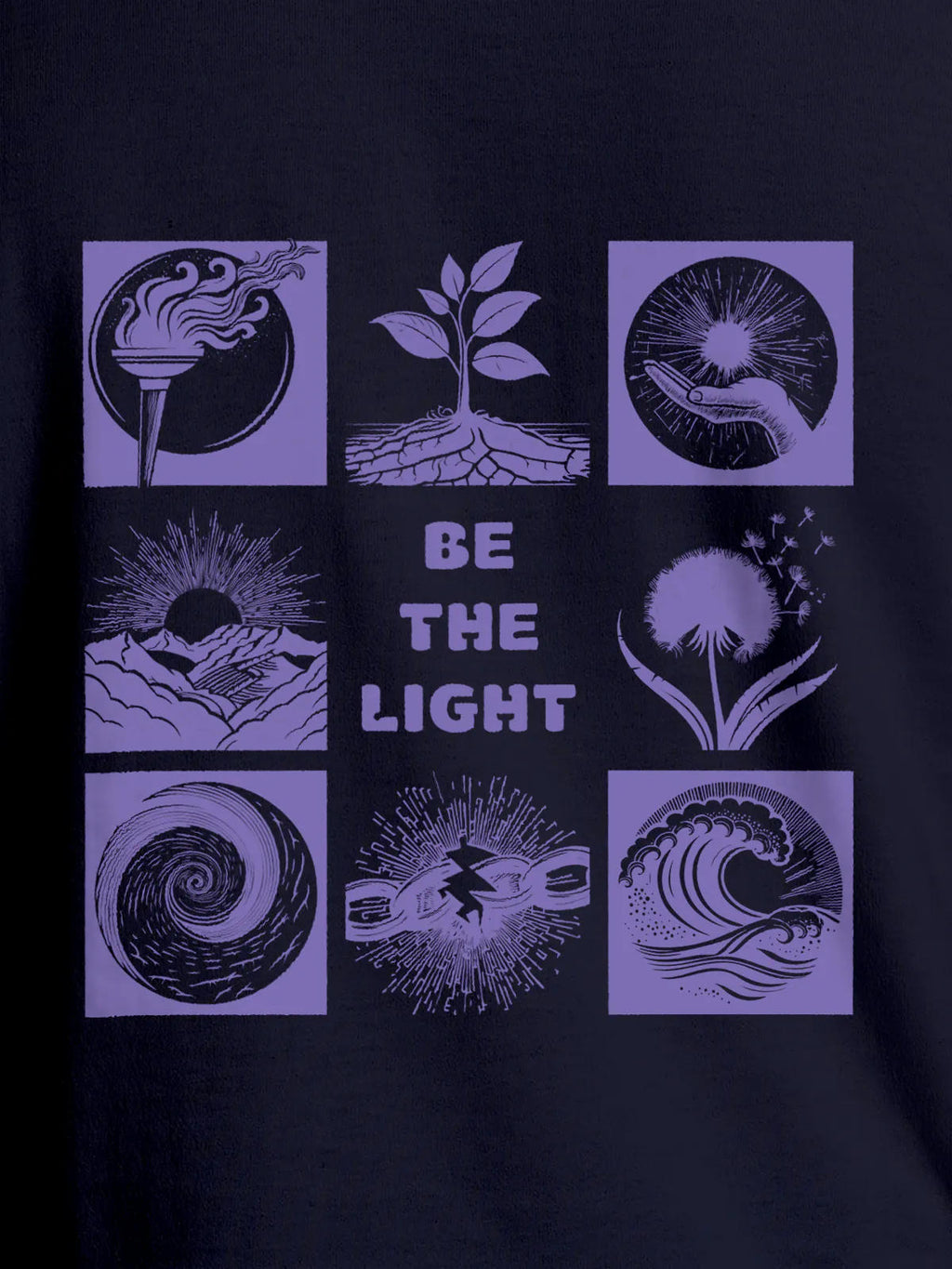 Close up of 'Be The Light' design on Men's Navy Blue Round Neck T-shirt, highlighting intricate details and vibrant print.