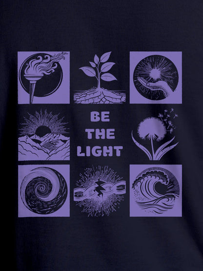 Close up of 'Be The Light' design on Men's Navy Blue Round Neck T-shirt, highlighting intricate details and vibrant print.