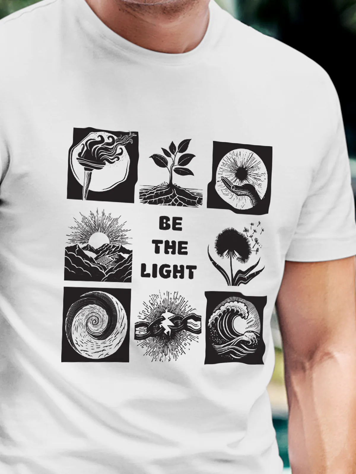 Close up of 'Be The Light' design on Men's White Round Neck T-shirt, highlighting intricate details and vibrant print.