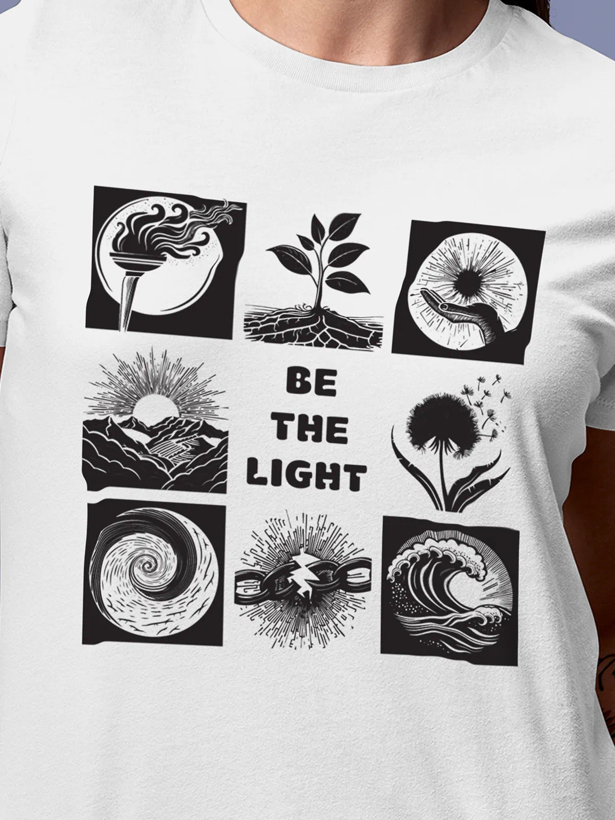 Close up of 'Be The Light' design on Women's White Round Neck T-shirt, highlighting intricate details and vibrant print.