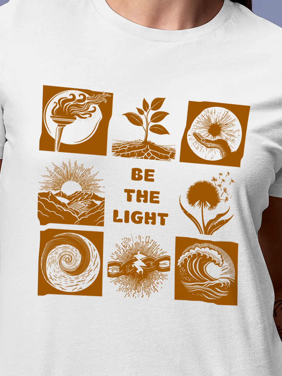 Close up of 'Be The Light' design on Women's White Round Neck T-shirt, highlighting intricate details and vibrant print.