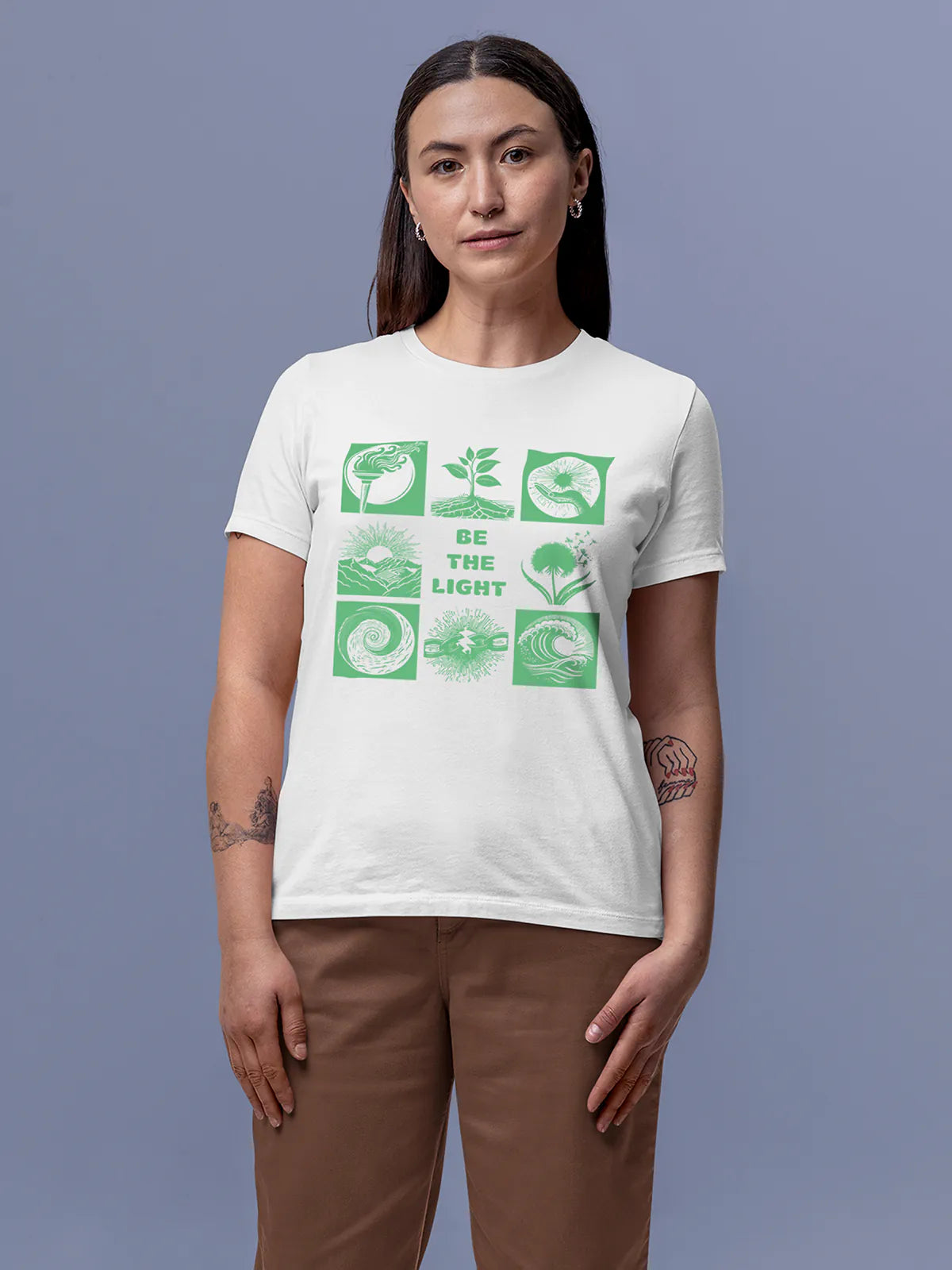 Model wearing Women's White Round Neck T-shirt with 'Be The Light' design, offering effortless style and premium comfort