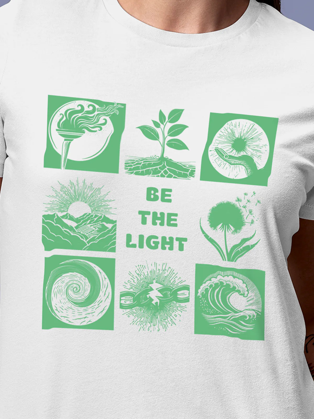 Close up of 'Be The Light' design on Women's White Round Neck T-shirt, highlighting intricate details and vibrant print.