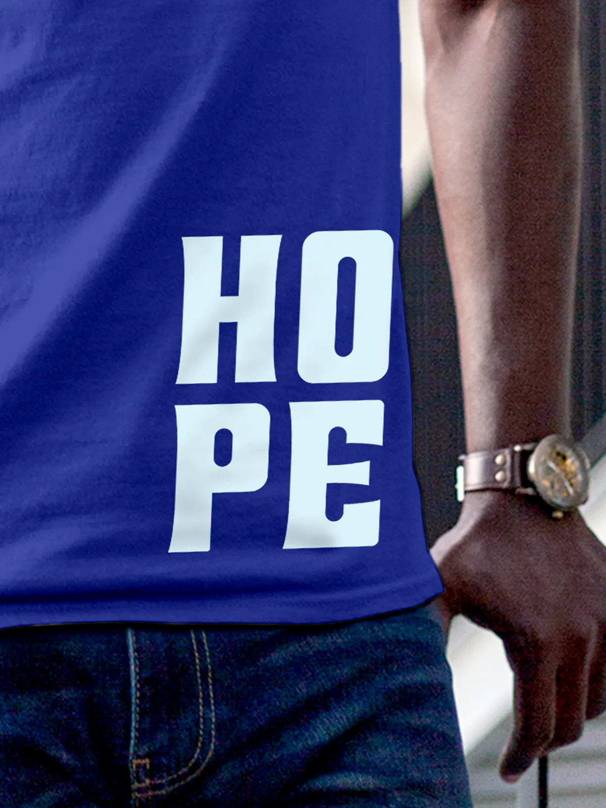 Close up of 'Hope' design on Men's Blue Round Neck T-shirt, highlighting intricate details and vibrant print.