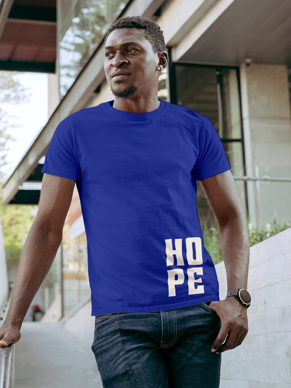 Model wearing Men's Blue Round Neck T-shirt with 'Hope' design, offering effortless style and premium comfort