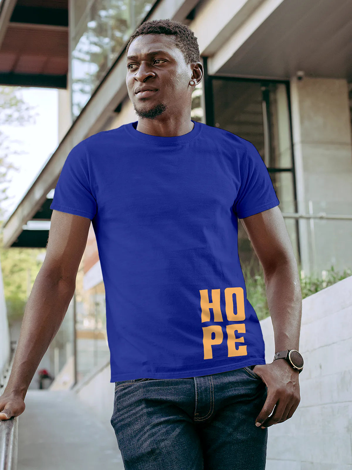 Model wearing Men's Blue Round Neck T-shirt with 'Hope' design, offering effortless style and premium comfort